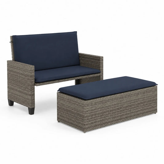 Conjunto de sofá y banco de mimbre con cojines azules